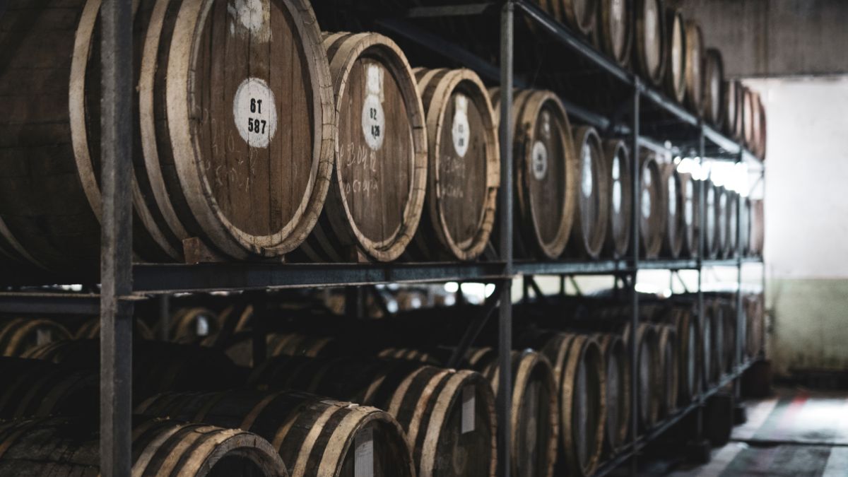 Whiskey Barrels in a Distillery